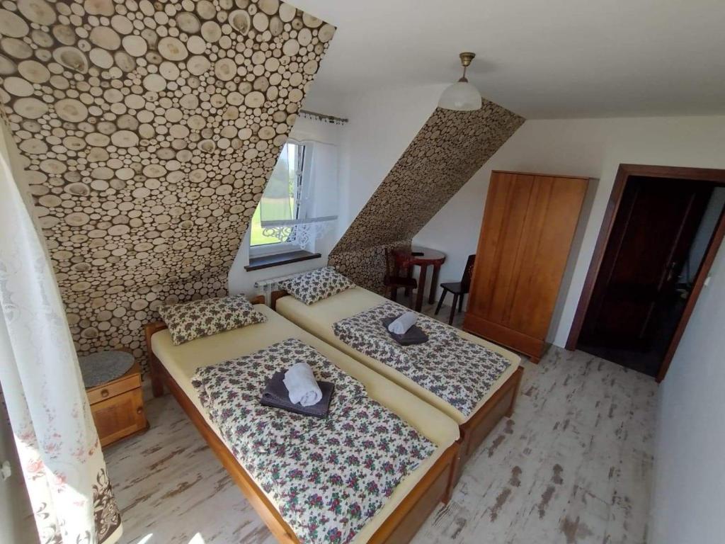 Fotografia z galérie ubytovania Śwarny Dworek v destinácii Międzyczerwienne
