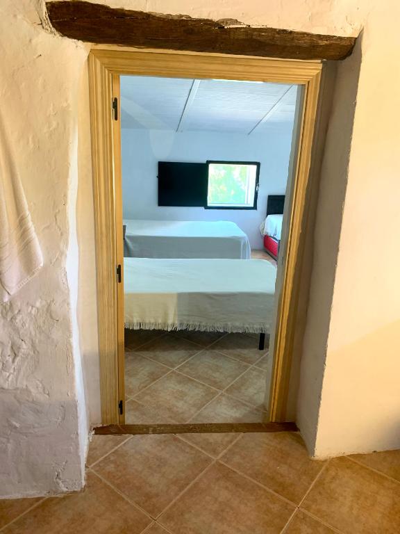 Televízia a/alebo spoločenská miestnosť v ubytovaní La Cabieda - Junto al Río Cañamares - ideal para grupos y familias