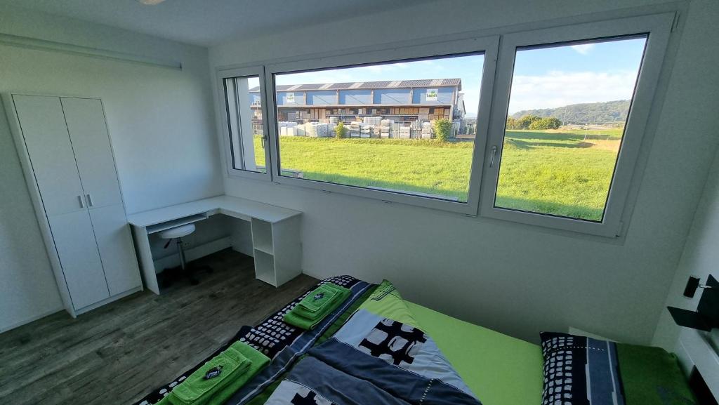 Postel nebo postele na pokoji v ubytování BeachIN - Sport, Events, Hotel, Restaurant, Bar