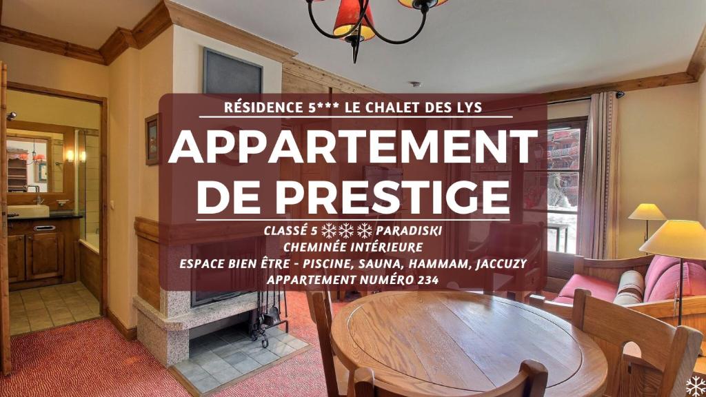 a sign in a room with a table and chairs at ARC 1950 - Suite de Prestige - Cheminée intérieur in Arc 1950