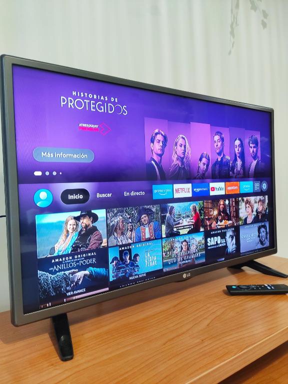 TV a/nebo společenská místnost v ubytování Almar Carril
