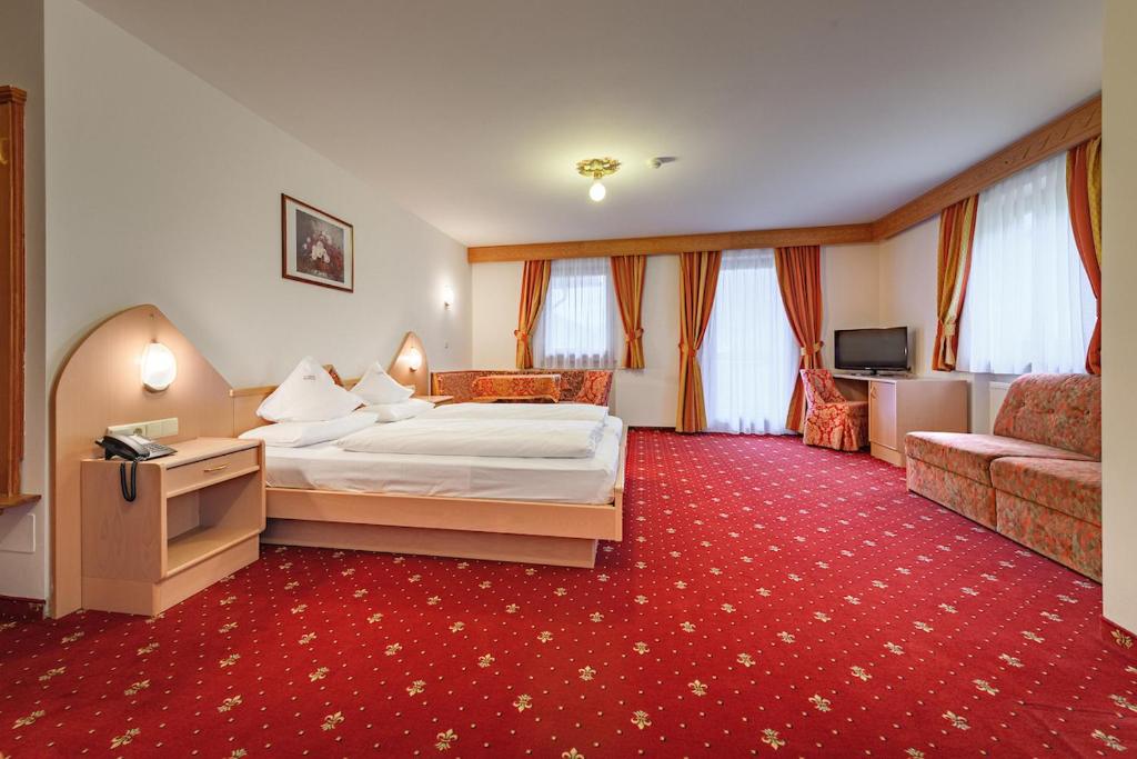 Postel nebo postele na pokoji v ubytování Hotel Ronce