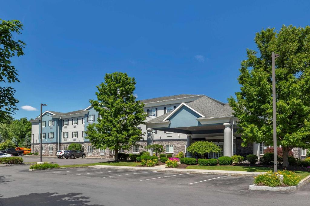 a building with a parking lot in front of it at Comfort Inn & Suites East Greenbush - Albany in East Greenbush