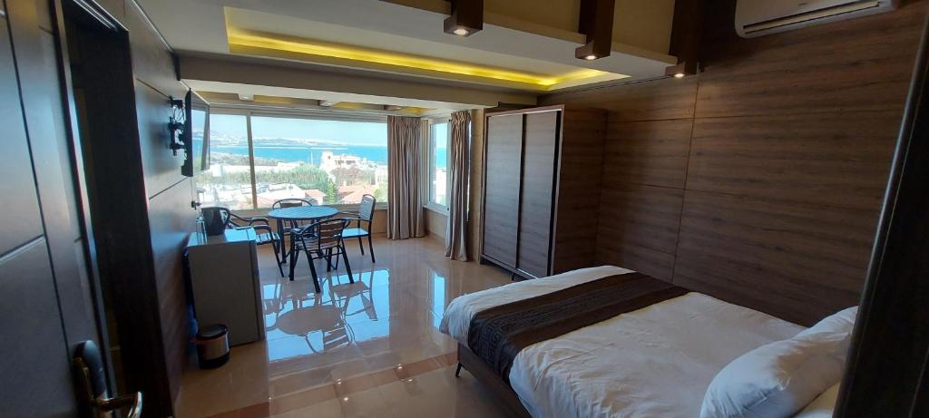 Postel nebo postele na pokoji v ubytování Aquarius Touristic Resort