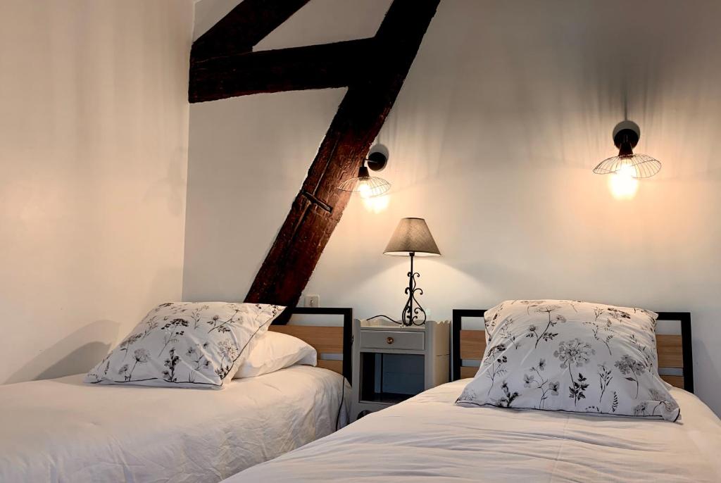 Postel nebo postele na pokoji v ubytování Hotel Savel