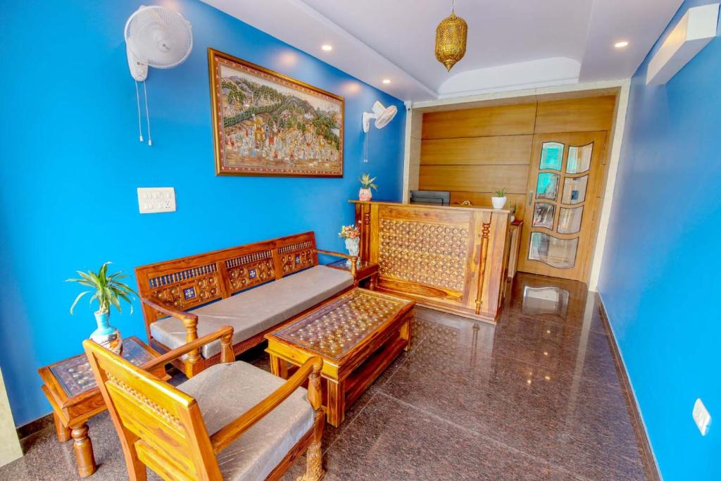 Zona d'estar a Gems Suites-A Boutique Stay
