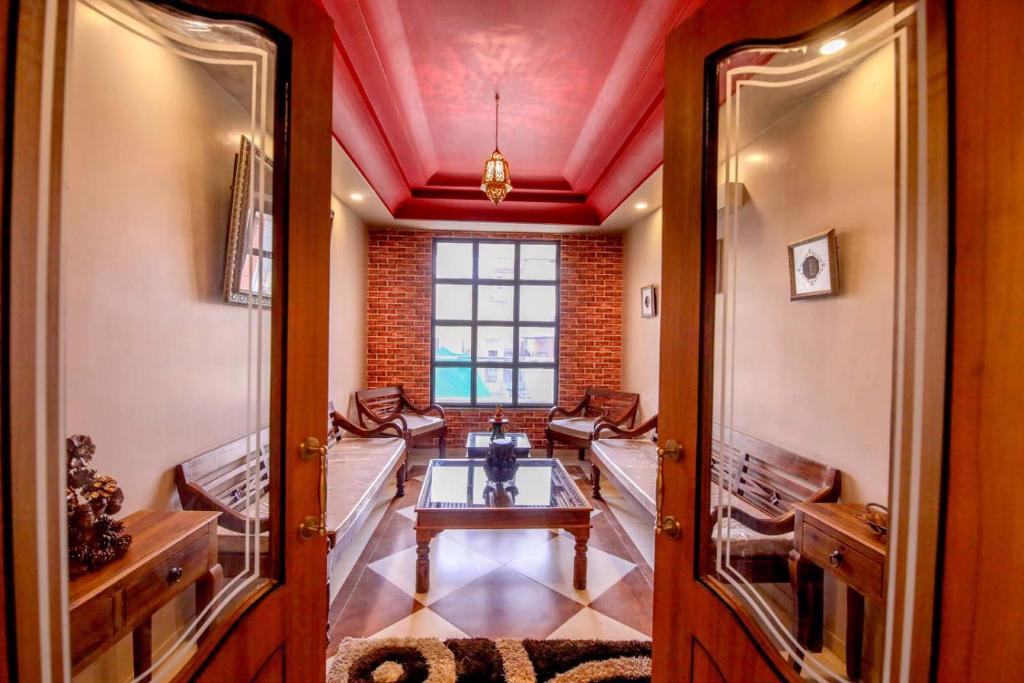 Zona d'estar a Gems Suites-A Boutique Stay
