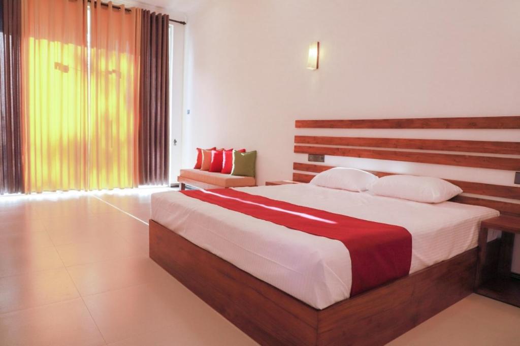 Postel nebo postele na pokoji v ubytování Hotel Anaulundawa