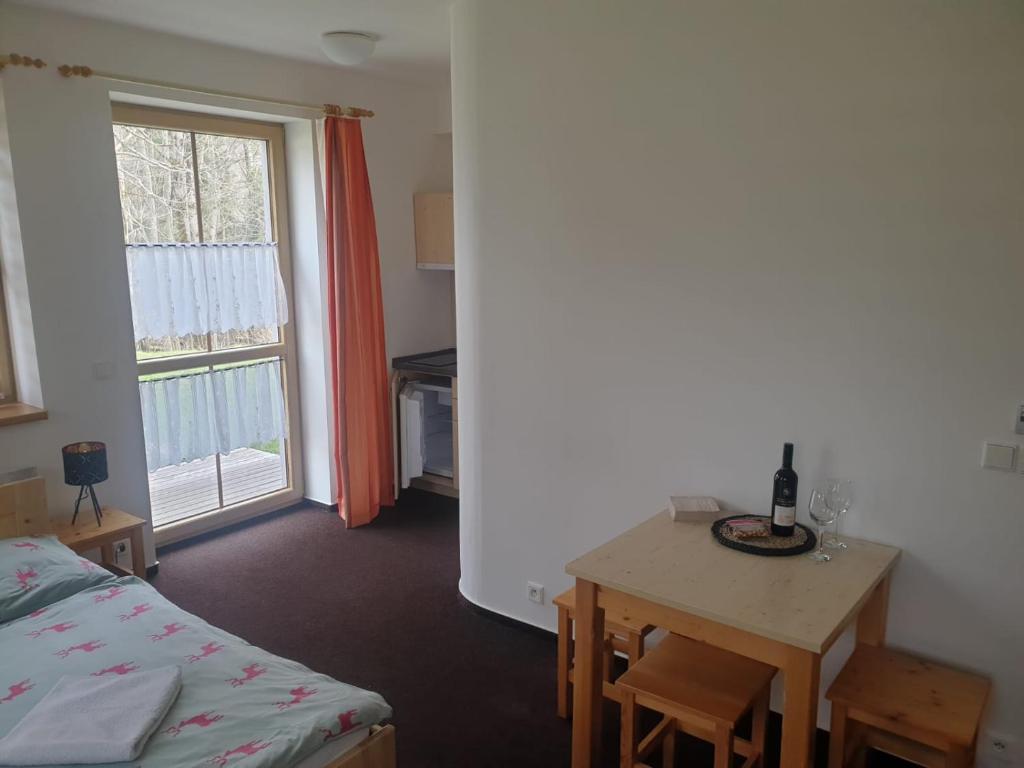 Postel nebo postele na pokoji v ubytování Apartmány Prášily