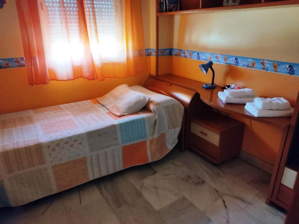 Posteľ alebo postele v izbe v ubytovaní Casa Bahía de Cádiz