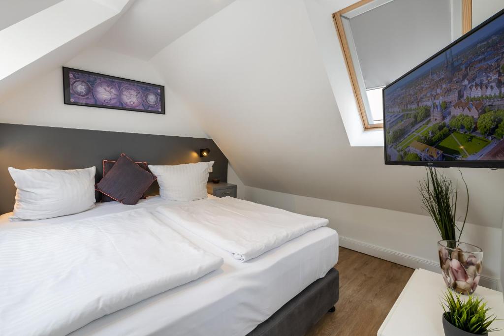 Postel nebo postele na pokoji v ubytování Hotel KO15