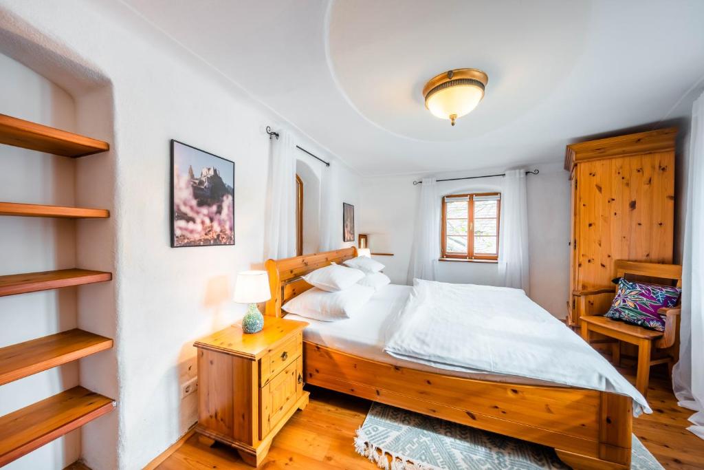 Postel nebo postele na pokoji v ubytování Smile Apartments mit Donaublick