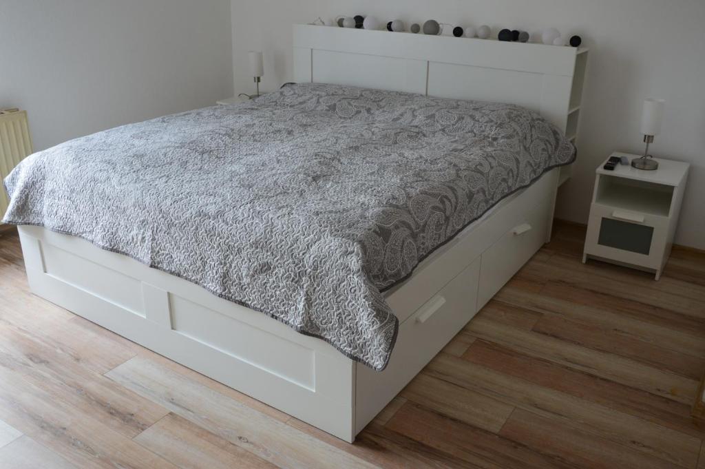 Postel nebo postele na pokoji v ubytování Horský apartmán Pod Zelenou Střechou