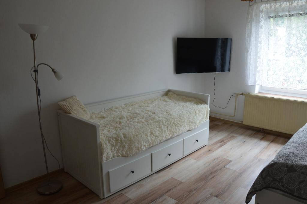 Postel nebo postele na pokoji v ubytování Horský apartmán Pod Zelenou Střechou