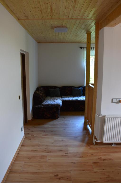 Postel nebo postele na pokoji v ubytování Horský apartmán Pod Zelenou Střechou