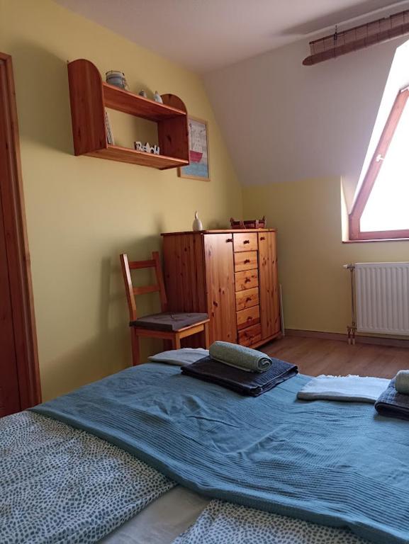Posteľ alebo postele v izbe v ubytovaní Mókus Apartman