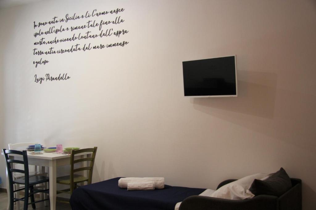 TV a/nebo společenská místnost v ubytování Apartments Capuana