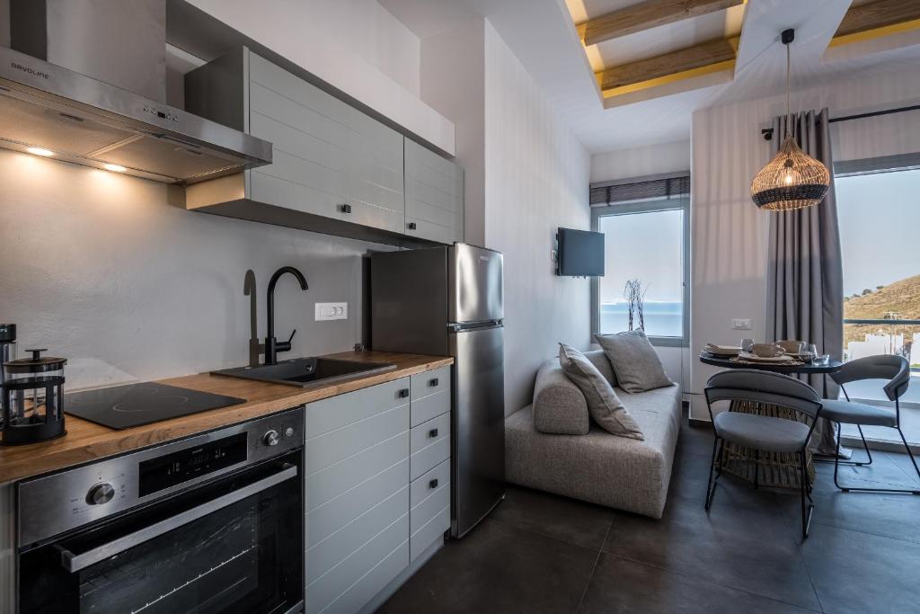 Kuchyň nebo kuchyňský kout v ubytování Vivere Luxury Suites