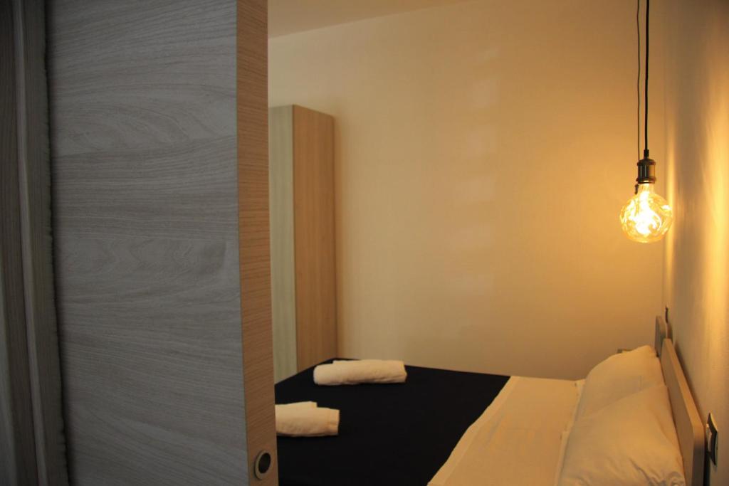 Postel nebo postele na pokoji v ubytování Apartments Capuana
