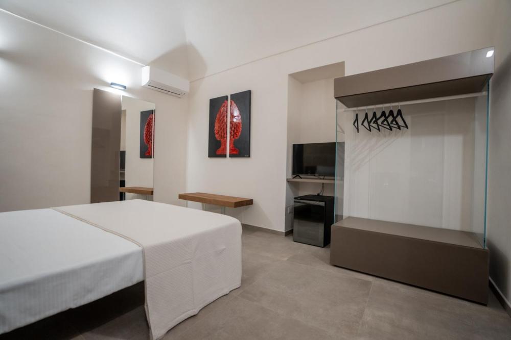 A bed or beds in a room at Setteminne Resort Design
