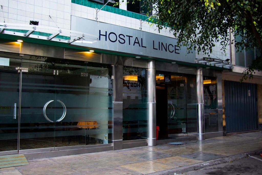 a building with a hospital line sign on it at Hostal Lince in Lima