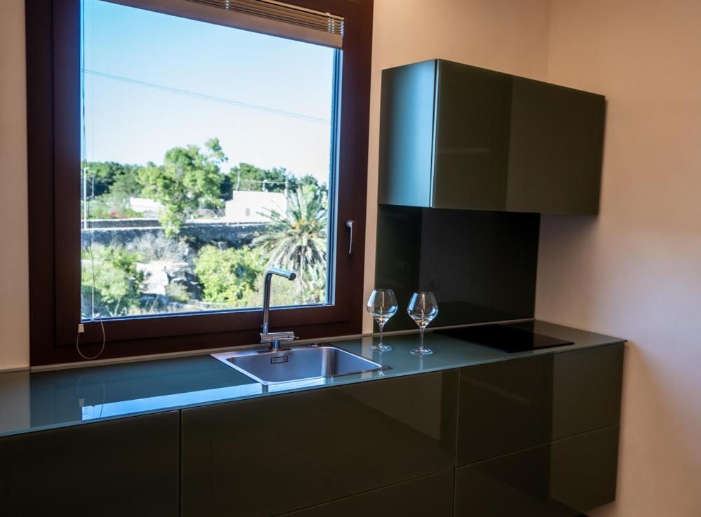A kitchen or kitchenette at Setteminne Resort Design