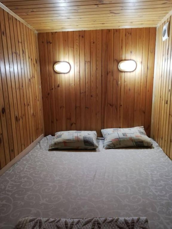Postel nebo postele na pokoji v ubytování Rodina Hotel