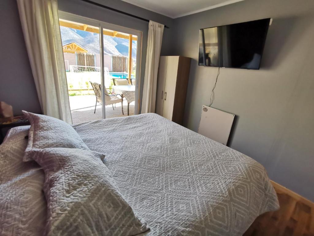 Ένα ή περισσότερα κρεβάτια σε δωμάτιο στο Refugio Guimanta