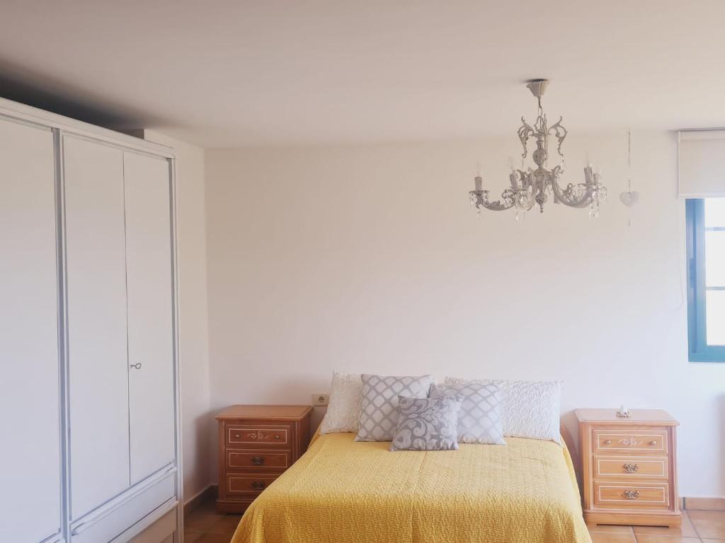 Postel nebo postele na pokoji v ubytování Castelodobispo - Ourense