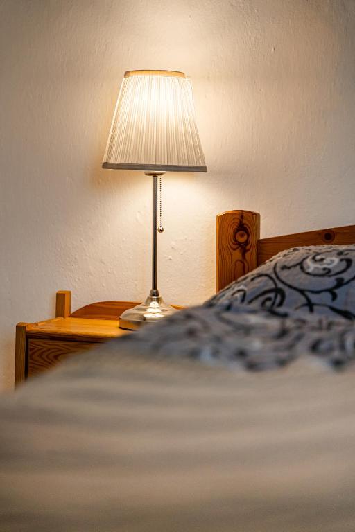 A bed or beds in a room at Apartman Belavita