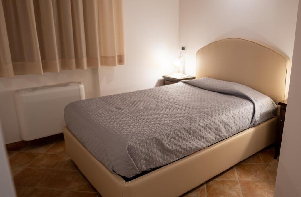 Posteľ alebo postele v izbe v ubytovaní Agriturismo Rende