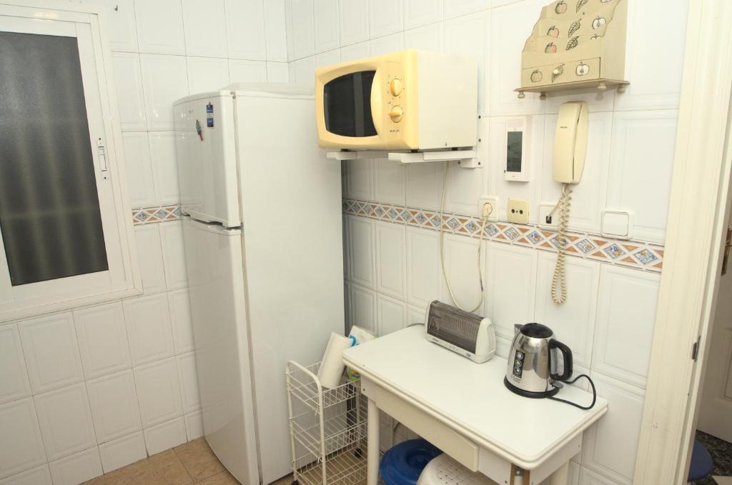 Kuchyňa alebo kuchynka v ubytovaní Habitación en el corazón del centro de Malaga