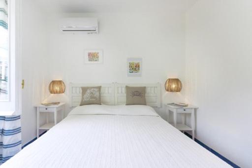 Giường trong phòng chung tại sole chiaro home
