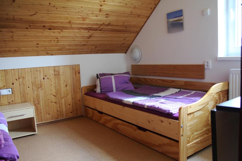 Postel nebo postele na pokoji v ubytování Apartmány Fialka