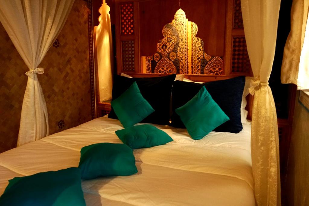 Кровать или кровати в номере Dar Belmamoun