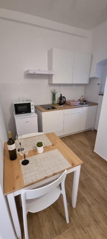 Kuchyňa alebo kuchynka v ubytovaní Apartments Vlaho
