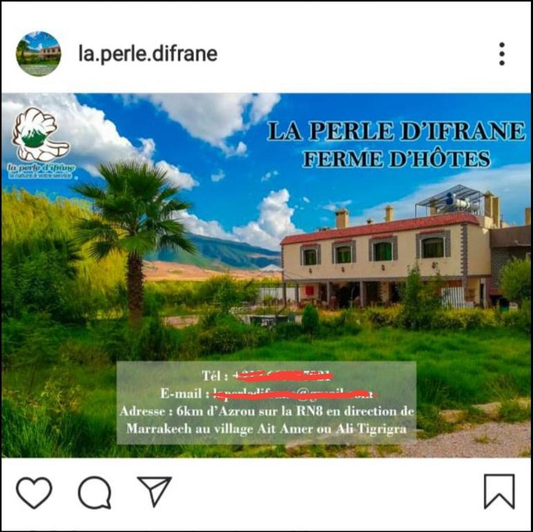 une page d'un site web avec une photo d'une maison dans l'établissement La Perle D'ifrane, à Azrou