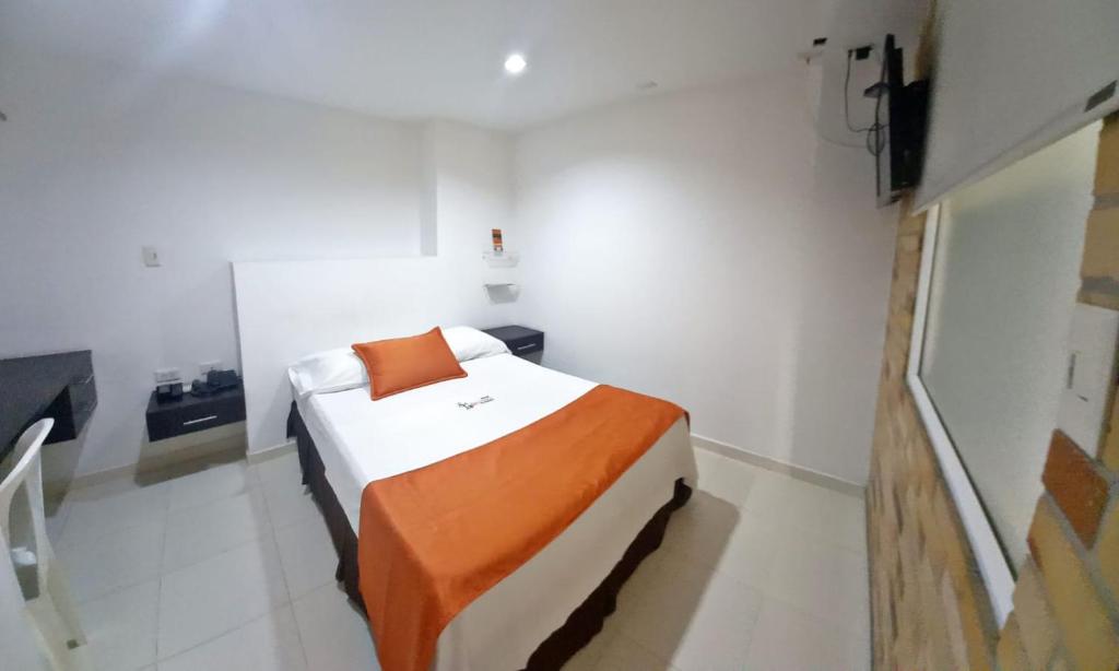 Posteľ alebo postele v izbe v ubytovaní Hotel San Lorenzo