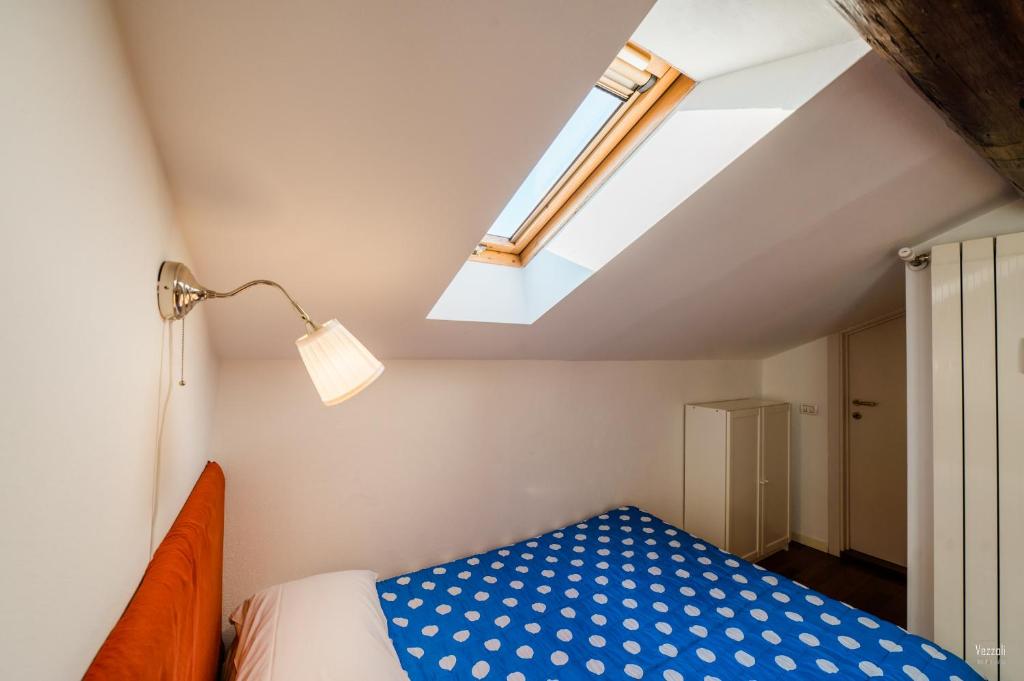 A bed or beds in a room at FEEL - Central Terrace
