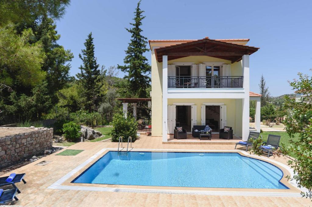 The swimming pool at or close to Villa Olympios Springs by Villa Plus