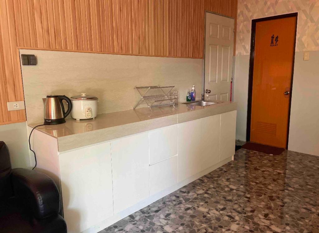 Kuchyň nebo kuchyňský kout v ubytování KeCai’s Place