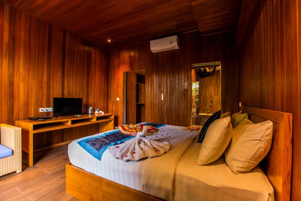 TV a/nebo společenská místnost v ubytování Seken Cottages Ubud