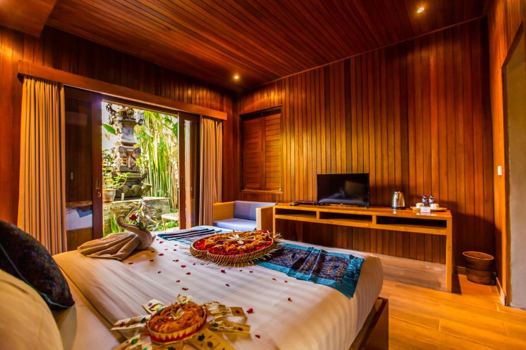 TV a/nebo společenská místnost v ubytování Seken Cottages Ubud