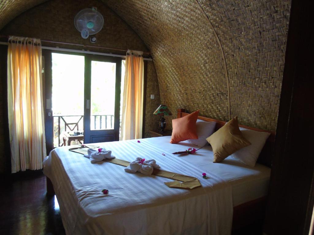Cama o camas de una habitación en Villas Ganjor