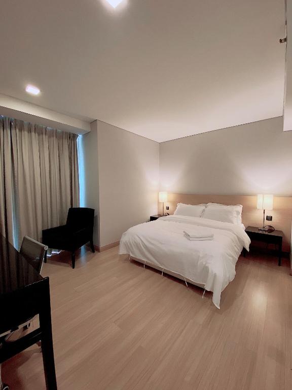 Postel nebo postele na pokoji v ubytování Straits Suite by C Homestay Malacca