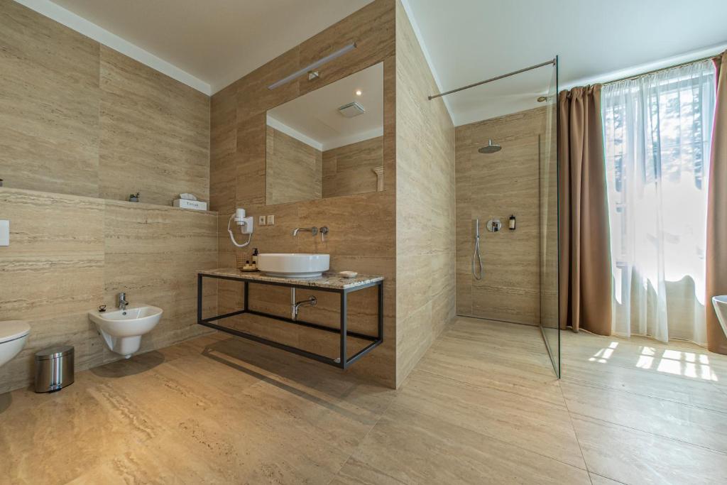 Koupelna v ubytování Wellness Hotel Pivovar Monopol