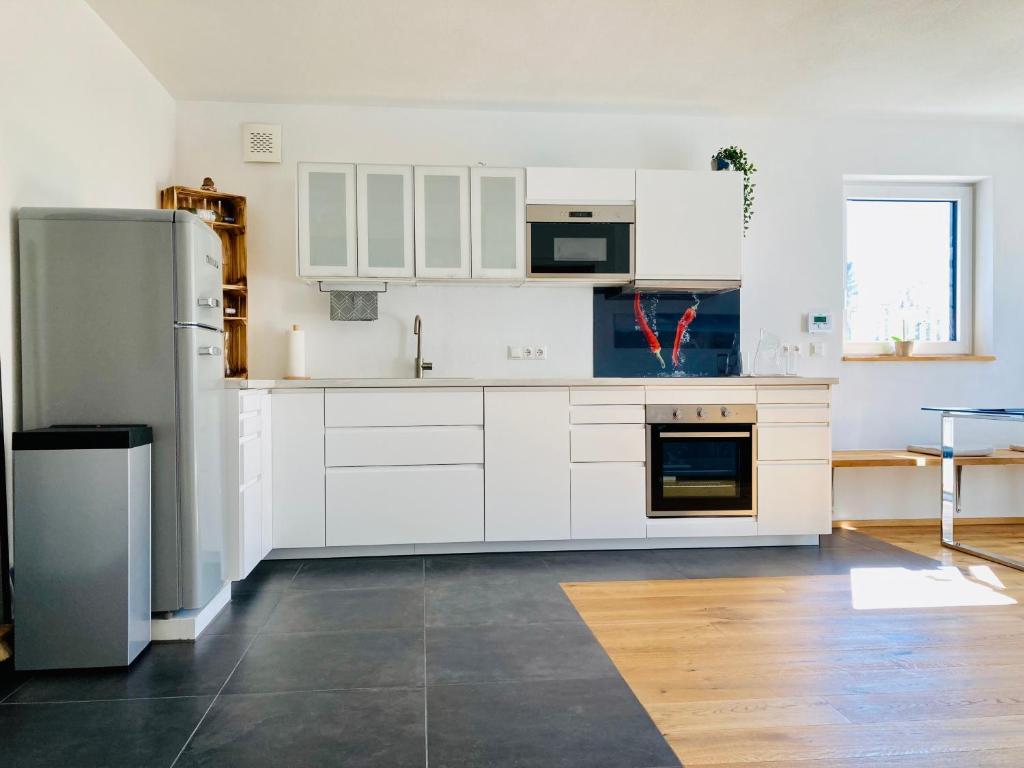 Kuchyň nebo kuchyňský kout v ubytování Ferienwohnung Kerschbaumer