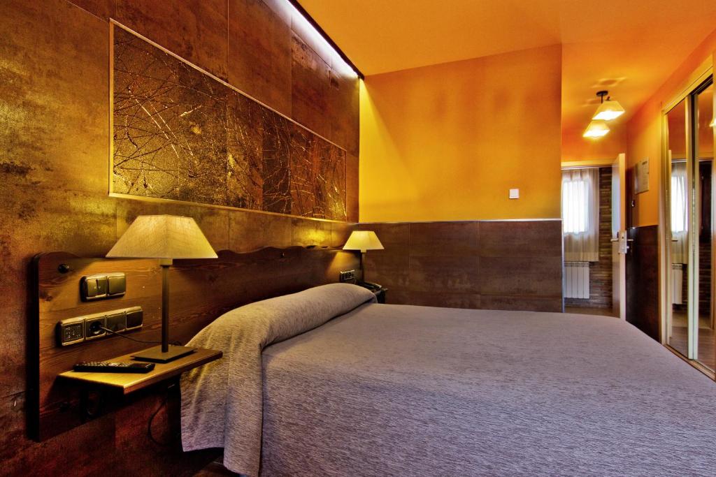 Postel nebo postele na pokoji v ubytování Hotel Doña Blanca