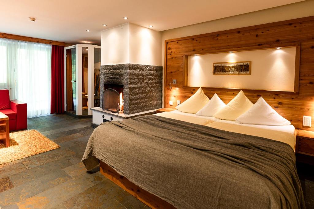 Postel nebo postele na pokoji v ubytování Hotel Edelweiss