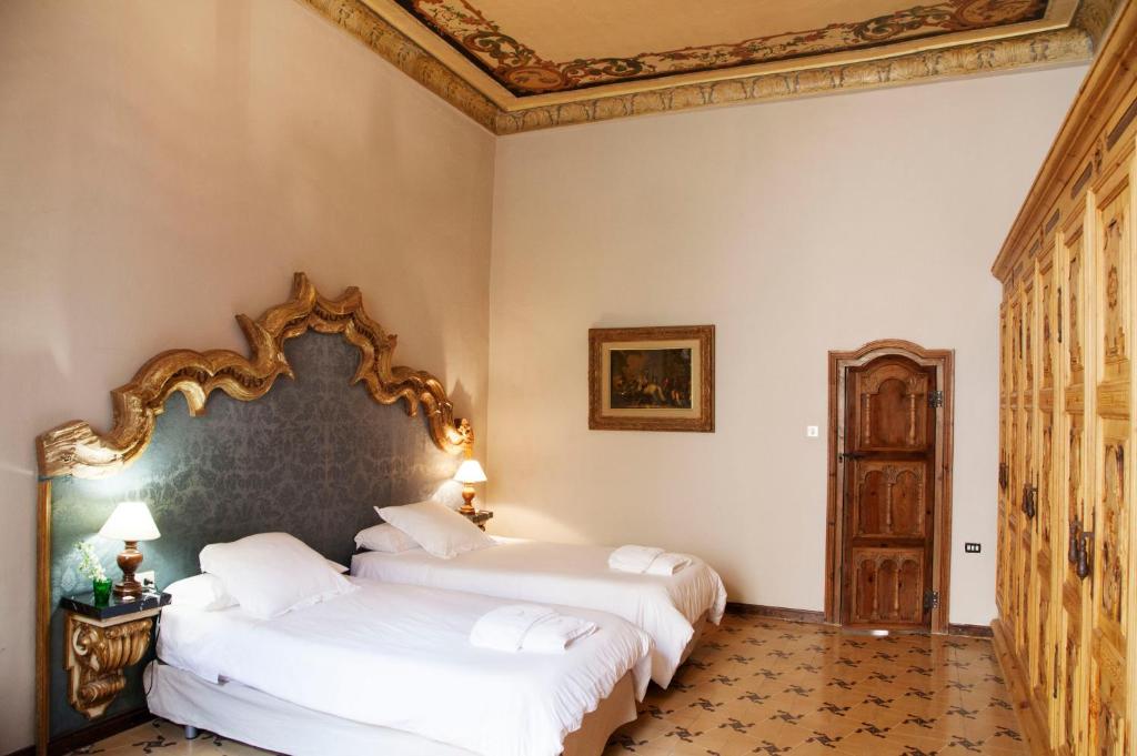 Postel nebo postele na pokoji v ubytování Lo Palauet de la Muralla